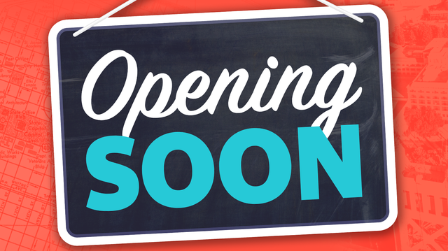 Opening Soon sign using a chalkboard with lettering.